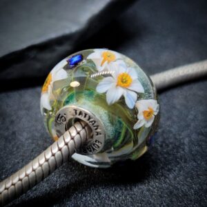 Narcissus with butterflies and grass bead